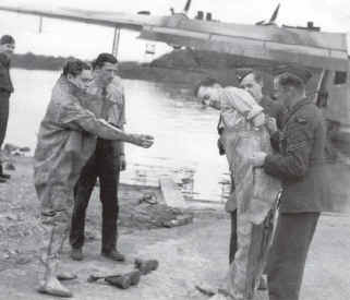 Suiting up at Rossclare salvage area.jpg (52156 bytes)